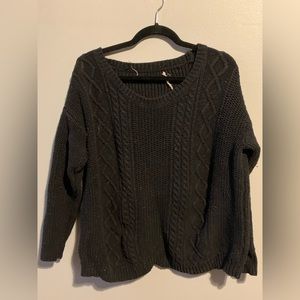 Blue cabled sweater w/ elbow patch detail